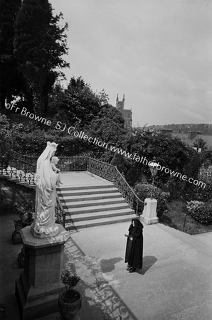 WEST GABLE - PRAYING AT STATUE B.V.M. WHERE B. WALLS ONCE STOOD